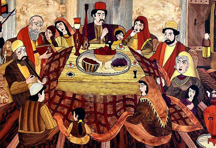 شب نشینی خانواده ایرانی بر سر سفره یلدا در قدیم