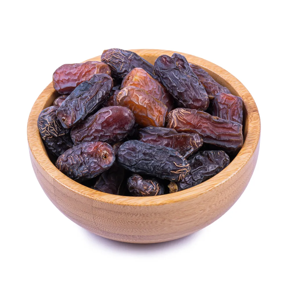 economic-piarom-dates in a wooden bowl