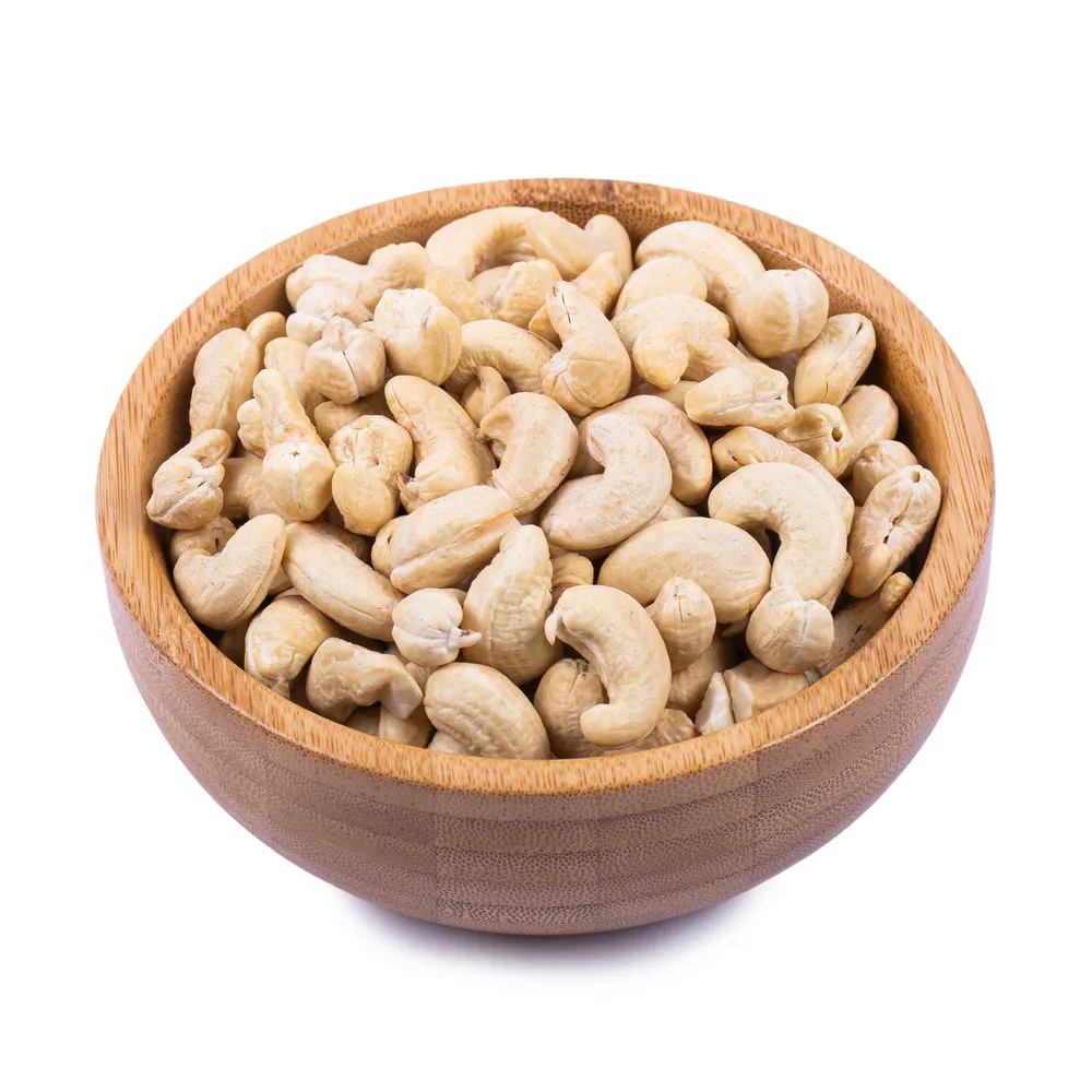 economic-raw-cashews in wooden bowl