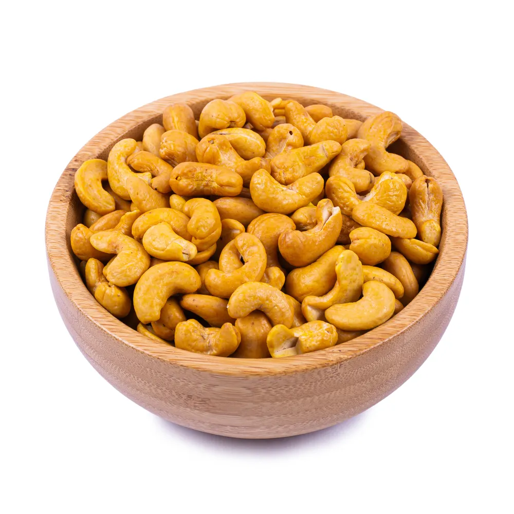 economic-roasted-saffron-cashews- in wooden bowl