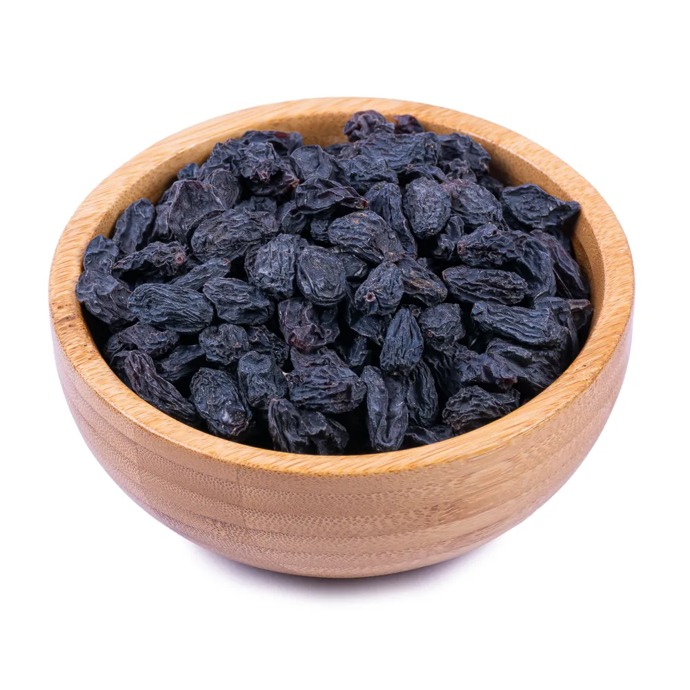 economic-shahani-raisins in wooden bowl