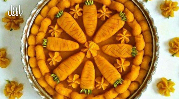 تصویر حلوای هویج با تزئین فرم کلی حلوا به شکل هویج‌های کوچک