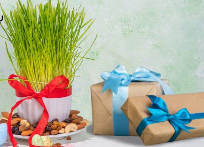 یک بسته هدیه با سبزه و آجیل عید